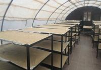 Solar greenhouse dryer for precooked fonio in Bamako (© Anne A., ESP-Ucad)